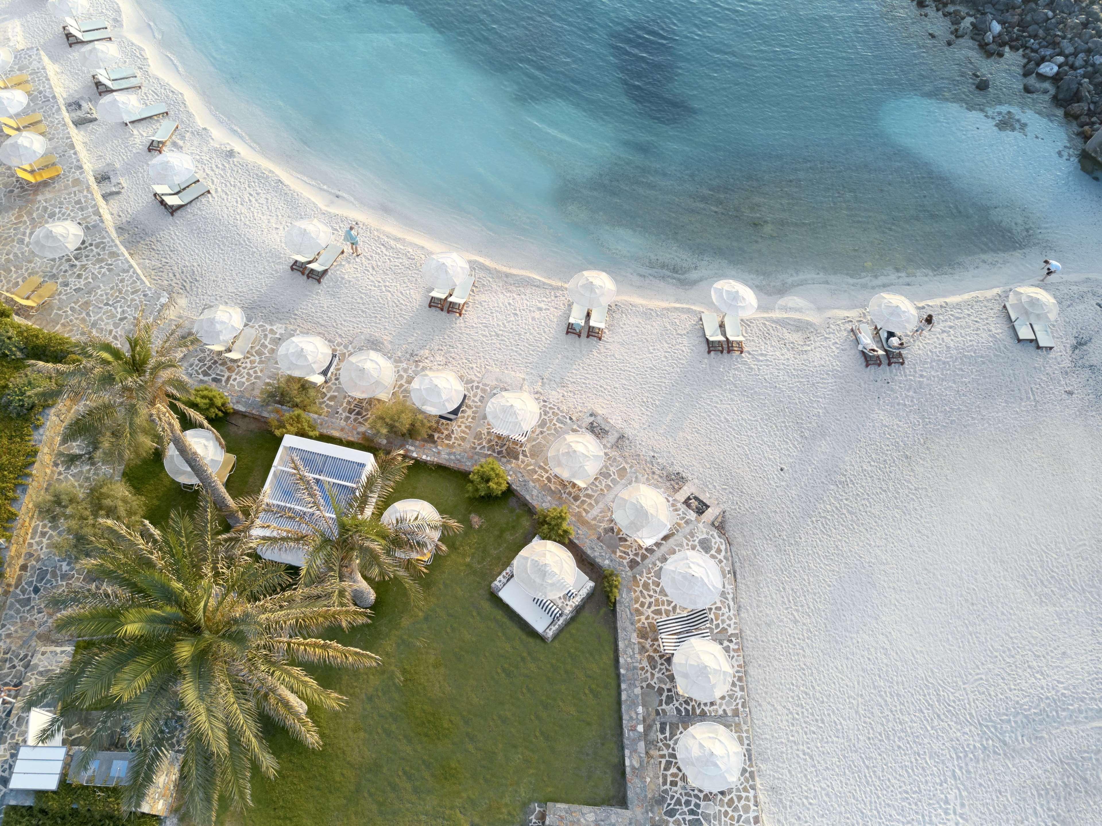 Minos Imperial Luxury Beach Resort & Spa Milatos Extérieur photo Aerial view of the beach at the resort