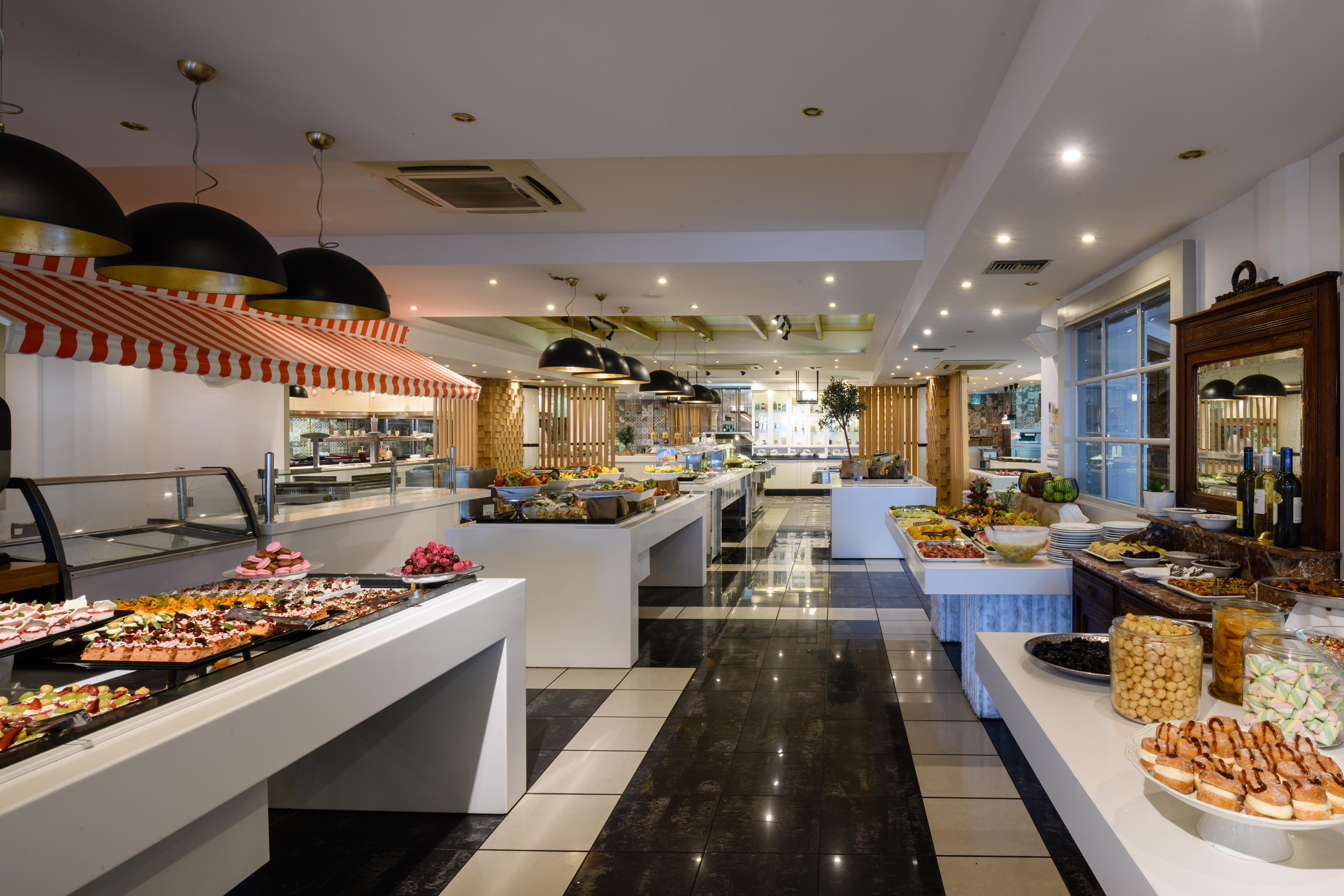 Minos Imperial Luxury Beach Resort & Spa Milatos Extérieur photo The buffet at the hotel