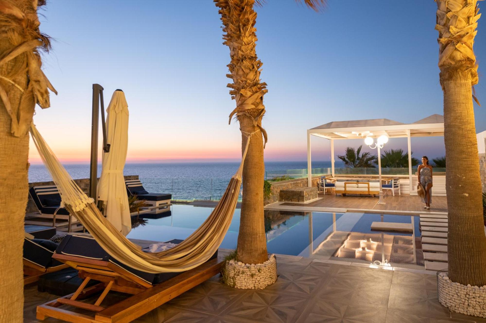 Minos Imperial Luxury Beach Resort & Spa Milatos Extérieur photo The pool at the hotel