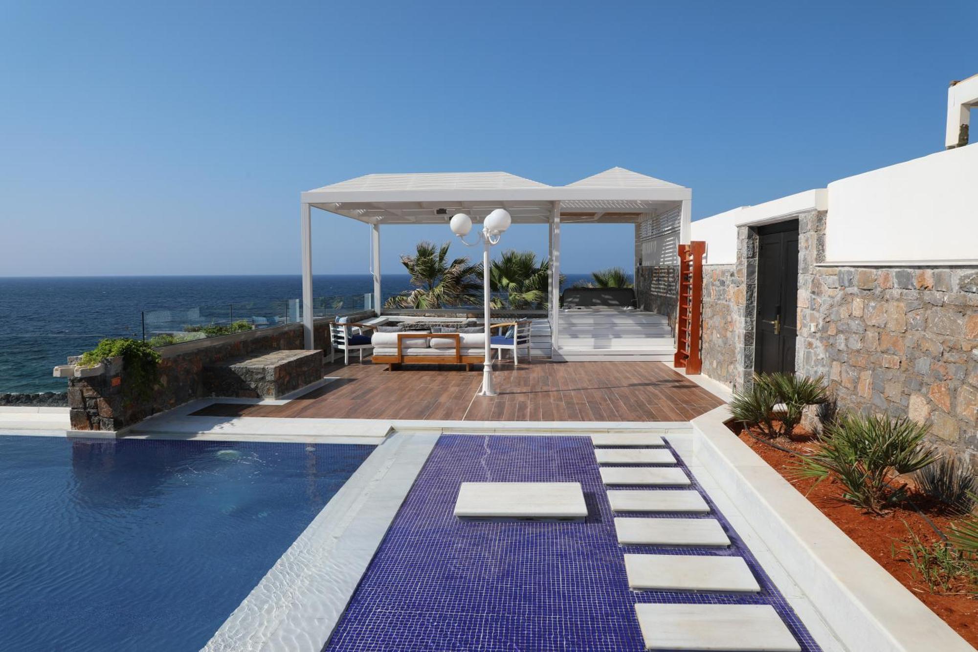 Minos Imperial Luxury Beach Resort & Spa Milatos Extérieur photo The pool at the hotel